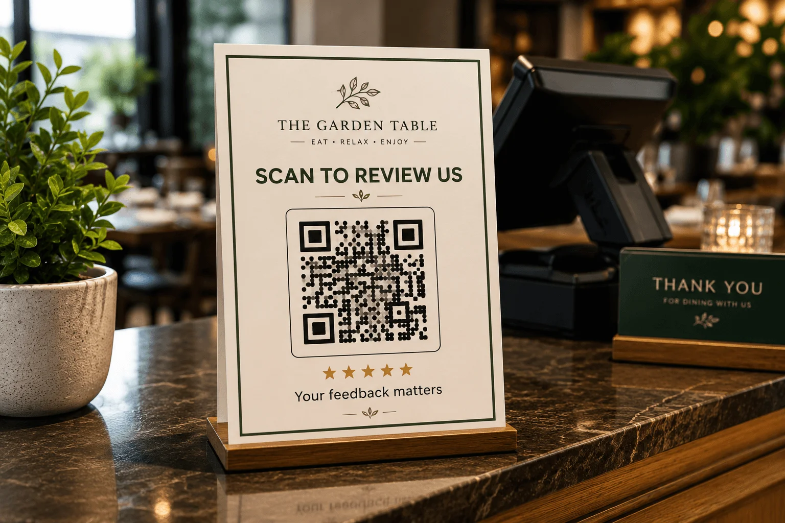 Customer scanning a Google review QR code on a shop counter